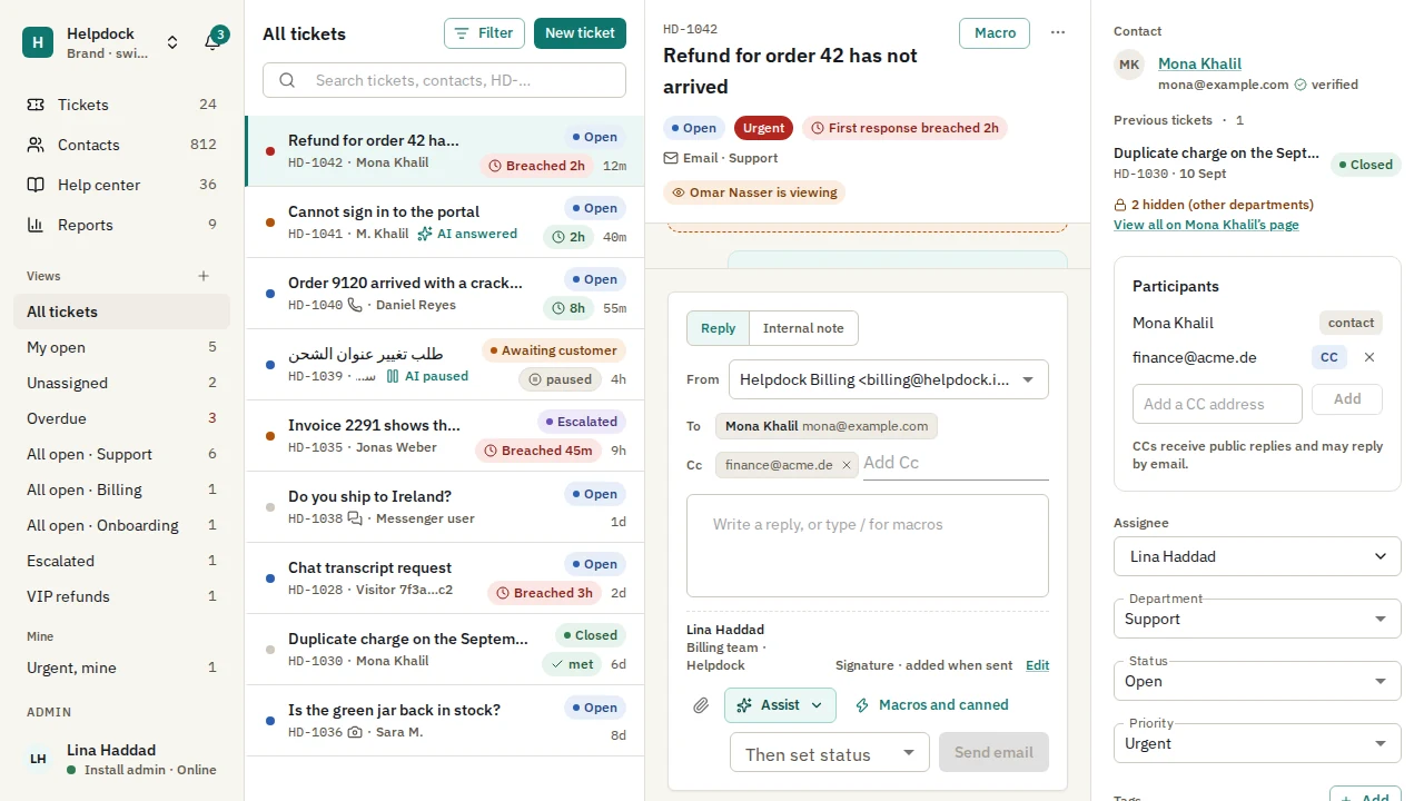 The Helpdock ticket workspace: the ticket list, an email ticket with its SLA badge and reply composer, and the contact card with the contact's previous tickets